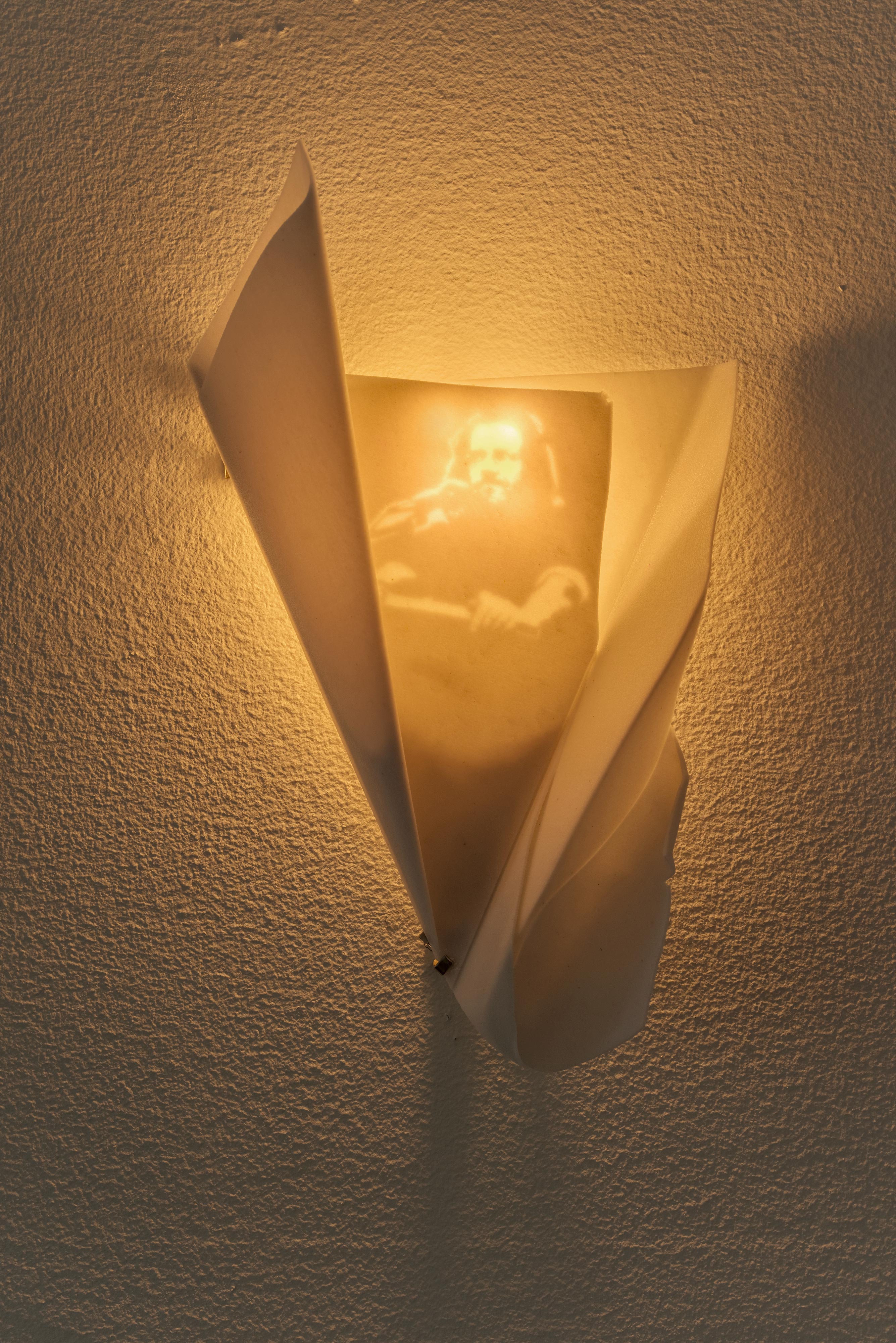David Muenzer<br>Sconce (This is Water)<br>2016<br>Sandstone, lighting hardware<br>4.938 x 8.028 in (12.5 x 20.4 cm)