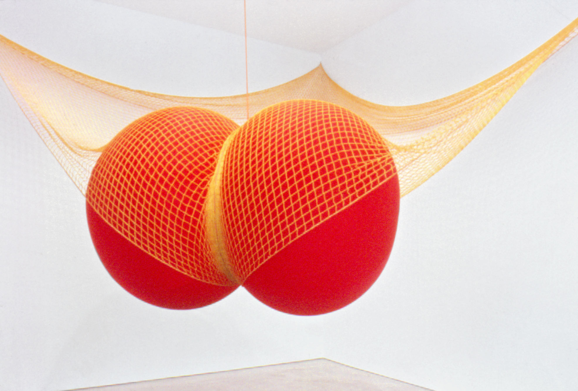 Nancy Davidson<br>Hang 'Em High<br>1999<br>Latex, fabric, rope, net<br>220 x 220 in